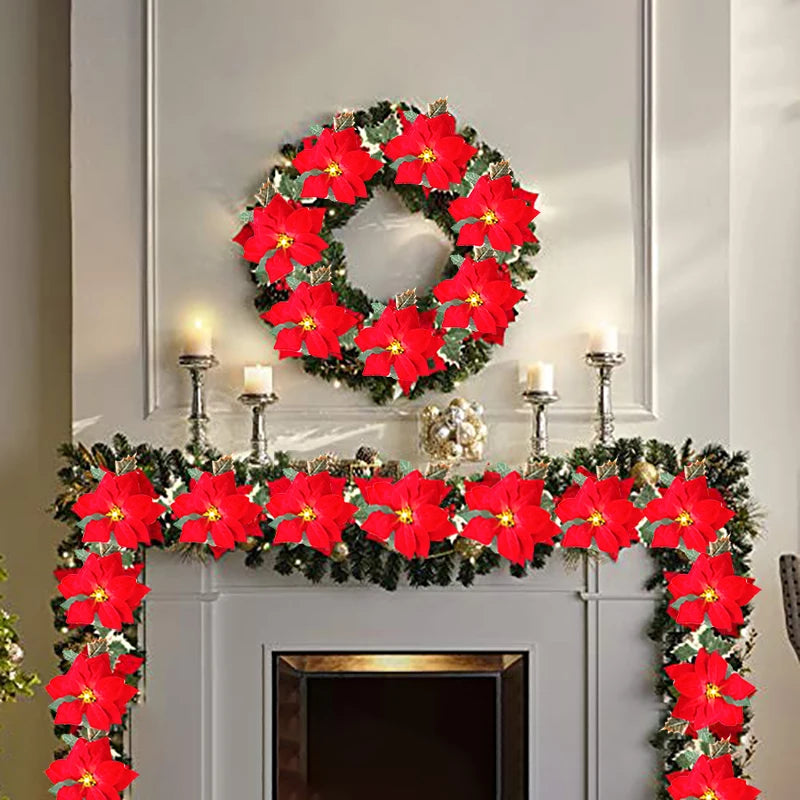 Detalle de las flores de pascua artificiales y las luces LED